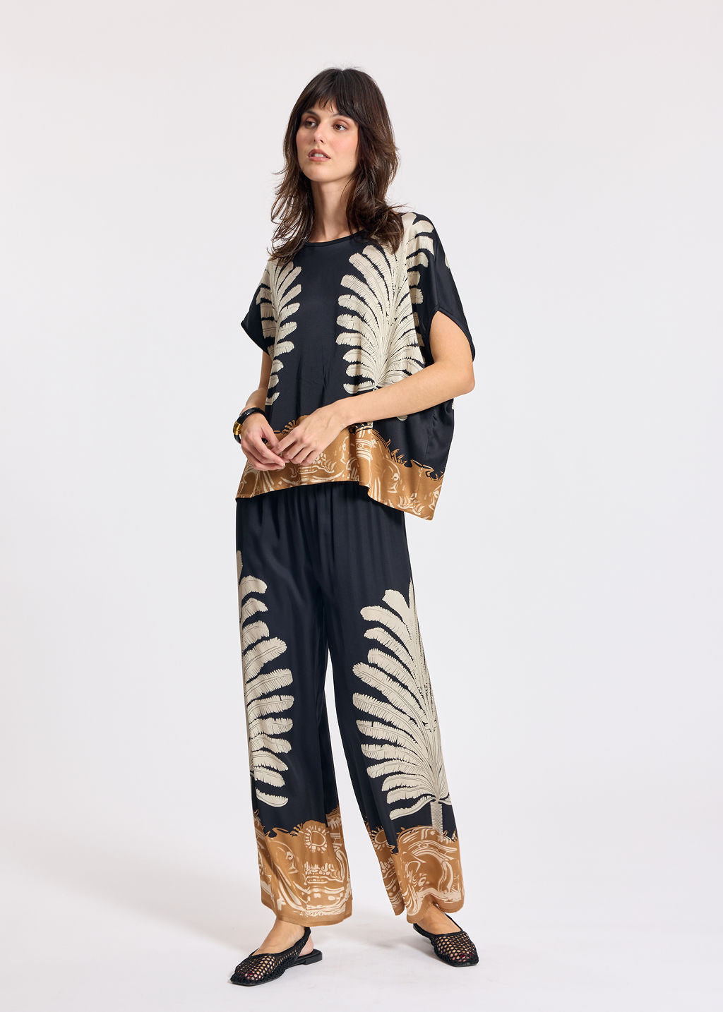 TOP NOUÉ AU DOS CARA NOIR