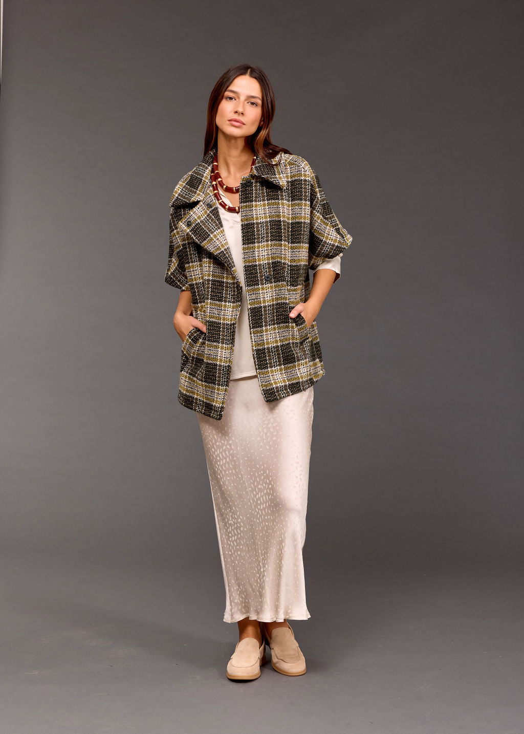 Sleeveless jacket fancy check pattern