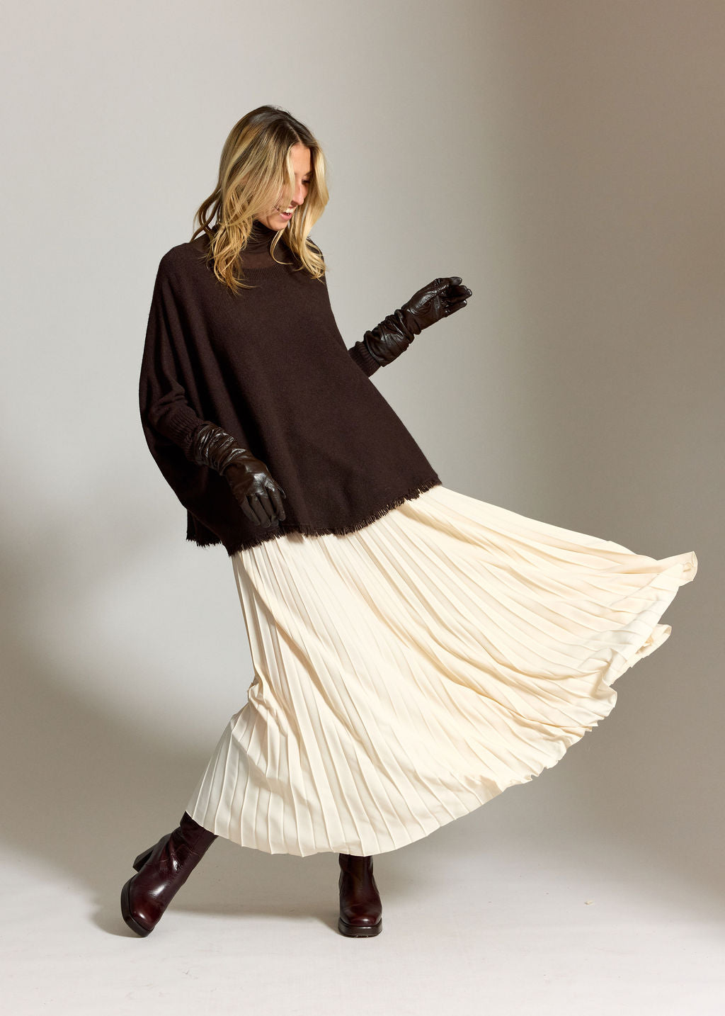 PULL PONCHO A FRANGES SIRO CAFE