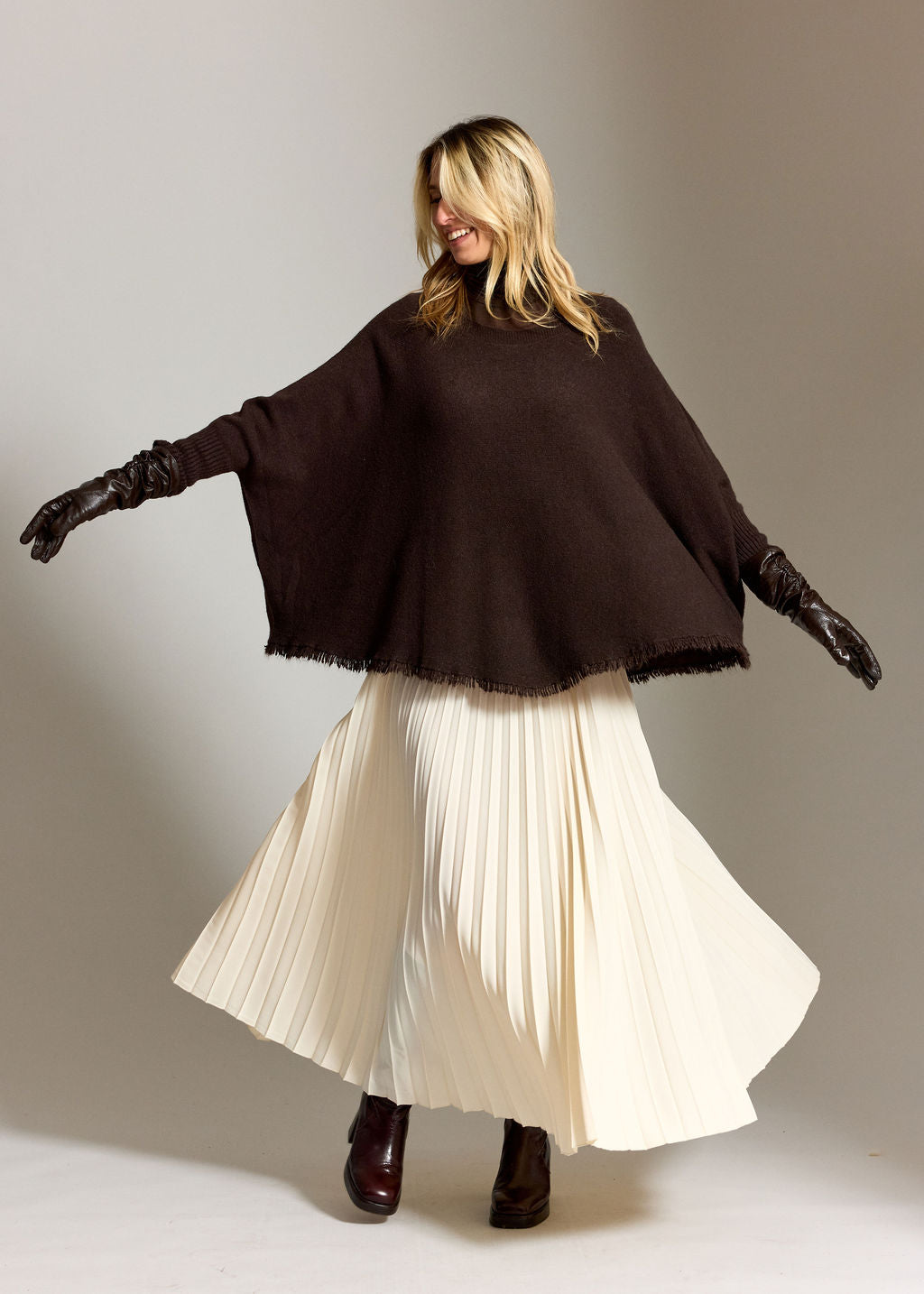 PULL PONCHO A FRANGES SIRO CAFE