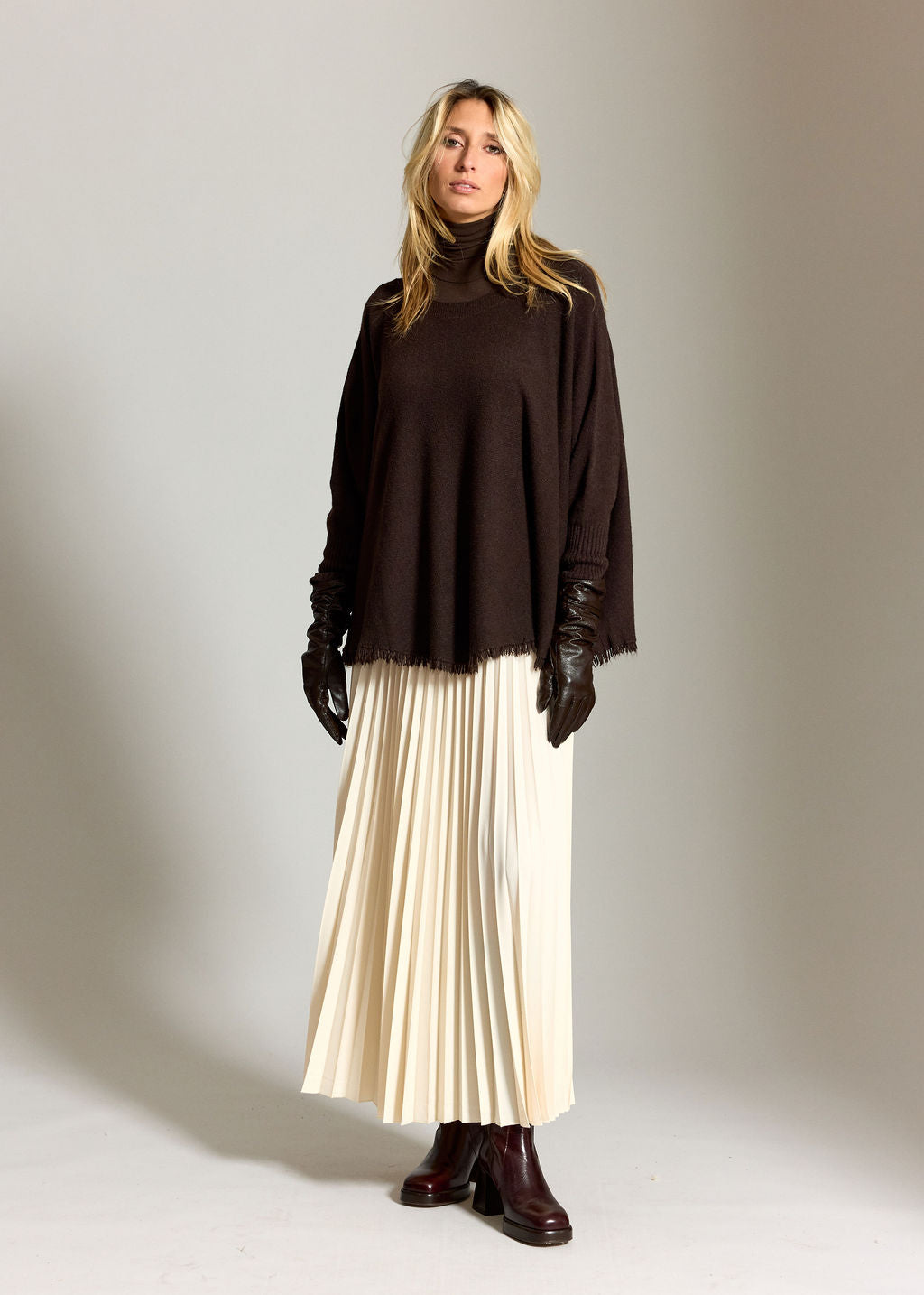 PULL PONCHO A FRANGES SIRO CAFE