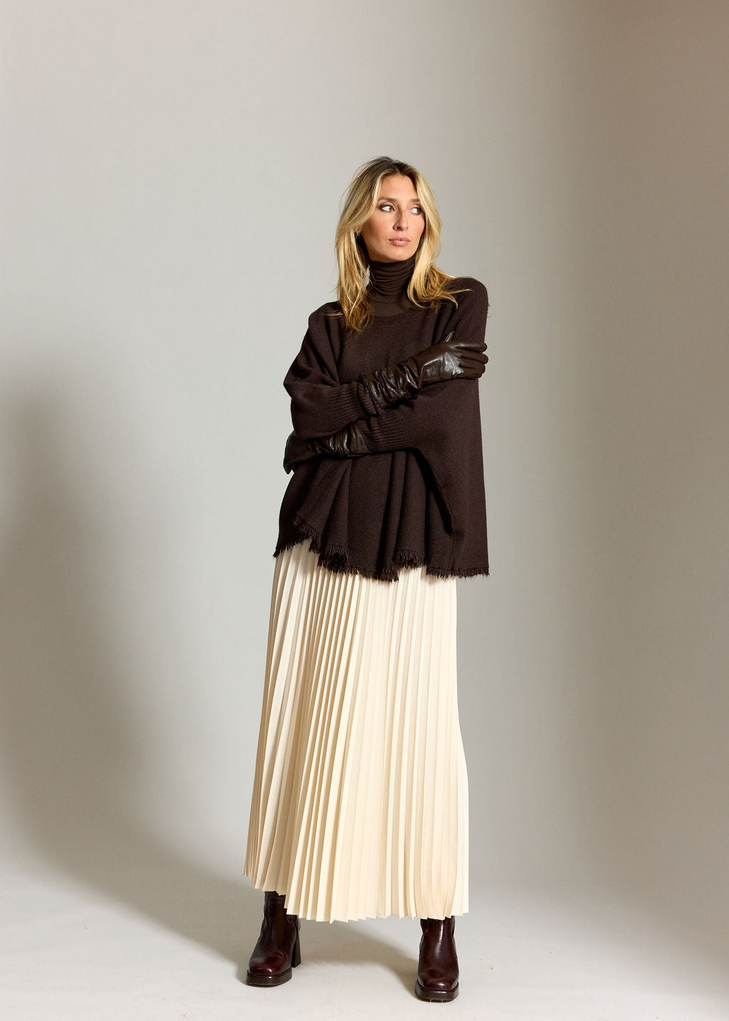 PULL PONCHO A FRANGES SIRO CAFE